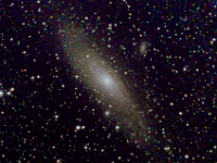 M31  Andromeda Galaxy. Taken at home on 11/23/05. Nikon 135mm lens at f/16, DSI-C camera. 60 seconds/image, total time 180 minutes (in the central area).
