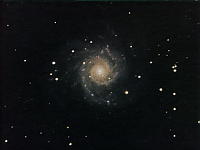 M74  Spiral Galaxy in Pisces. Taken at home on 10/27/06.  Meade RCX400 10" scope, DSI-Pro camera, f/3.3 focal reducer. 15 seconds/image, total time 181 minutes (RGB=60:60:61). First light for my observatory.