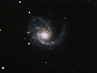 M99  Spiral galaxy in Coma Berenices. Take at home on 04/15/07.  Meade RCX400 10", DSI-Pro II camera, f/3.3 focal reducer. 60 seconds/image, total time 120 minutes (RGB = 40:40:40).