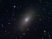 M110  Galaxy in Andromeda, a satellite to M31. Taken at home on 12/05/08.  Meade RCX400 10" scope, ST-10XME camera. 120 seconds/image, total time 126 minutes (LRGB=60:22:22:22). Note: the dark areas in the galaxy are dust clouds, not image artifacts!