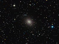 NGC 185  Dwarf Elliptical Galaxy in Cassiopeia. Taken at home on 08/27/13, 08/28/13, 09/03/13, 09/06/13. PlaneWave CDK 12.5" scope, ST-10XME camera. 300 seconds/frame, total time 14h 30m (LRGB = 435:150:140:145 minutes).