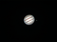 Jupiter  Jupiter with its satellite Ganymede. Taken at home on 03/31/05.  Meade LX200 GPS 8" scope, alt/az mount, DSI-C camera. 0.2 seconds/frame, total time 21 seconds (over a longer period of time).