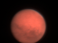 Mars  Mars. Taken at home on 11/20/05. Meade LX200 8" scope, DSI-C camera, 6x Barlow. 0.015 second/frame, 104 frames/group, one group every 10 minutes, total time 240 minutes. Made into a movie.