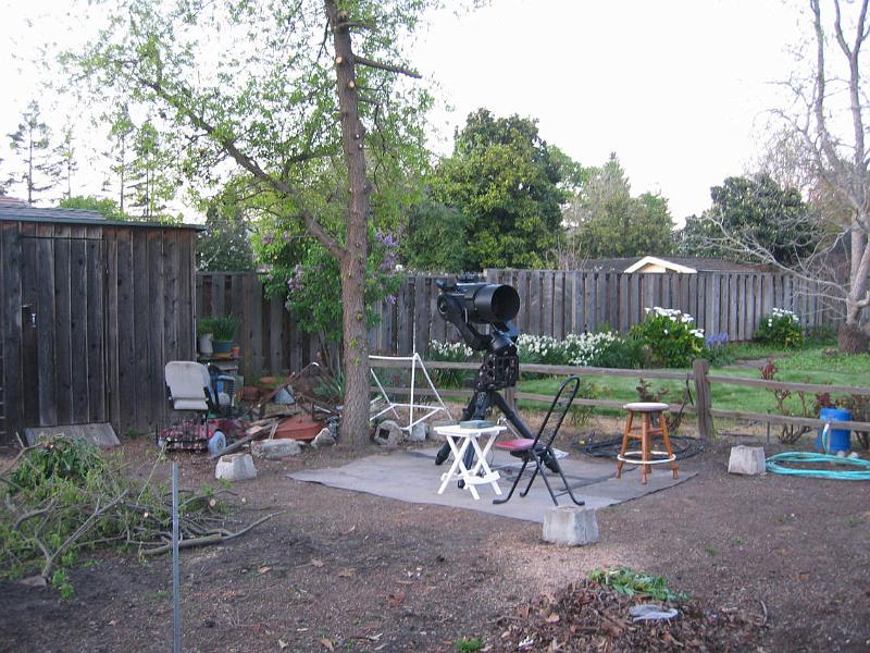 F0163_0011.jpg - This shows my RCX400 set up for a trial observing session to see how an 8'x10' observatory would work. I've started to trim away the branches from the oak tree so I can get a clear view of the sky.