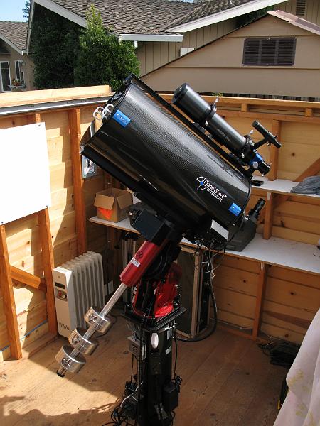 G0103_0040.JPG - I have now replaced the RCX400 with a PlaneWave CDK 12.5" sitting on a Paramount MX mount.  This system is a pretty tight fit for the observatory.  I have to park the scope carefully to clear the roof, and it is now hard to move around all sides without bumping into something.